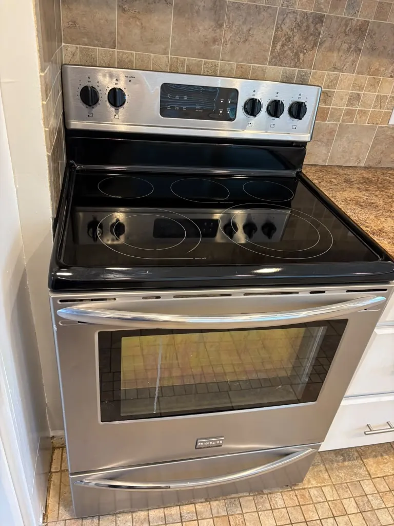 Spotless glass-top stove after a deep cleaning